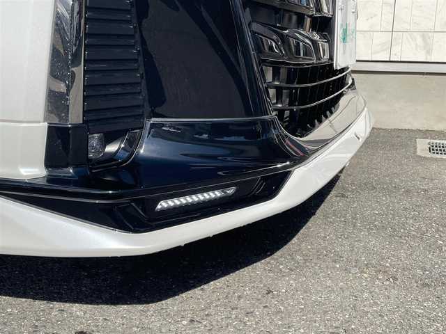 トヨタ ヴェルファイア ハイブリット Z プレミア 埼玉県 2023(令5)年 2.6万km プラチナホワイトパールマイカ ワンオーナー/AIS検査済み/GRフルエアロ/純正ナビゲーション/・フルセグテレビ/・AppleCarPlay/・AndroidAuto/・BT/トヨタチームメイト/セーフティセンス（予防安全パッケージ）/レーダークルーズコントロール/レーンキープ/ブラインドスポットモニター/パーキングブレーキサポート/オートパーキング/ヘッドアップディスプレー/オートマチックハイビーム/パノラミックビューカメラ/パノラマルーフ/デジタルインナーミラー/前後ドライブレコーダー/1、2列目快適温熱シート/運転席&助手席パワーシート/2列目エグゼクティブパワーシート/ハンドルヒーター/置くだけ充電/両側パワースライドドア/パワーバックドア/LEDフロントフォグランプ/100V電源