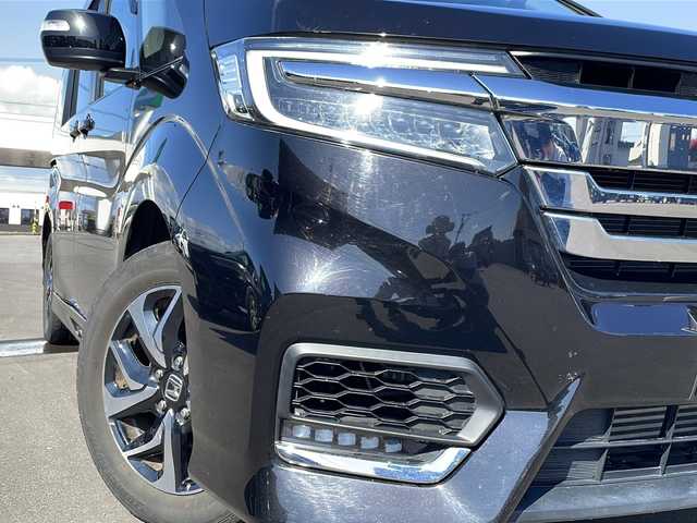 ホンダ ステップワゴン スパーダ ホンダセンシング 道北・旭川 2021(令3)年 3.1万km プレミアムスパークルブラックパール /寒冷地仕様//純正9インチナビ/　CD/DVD/BT/TV/USB/HDMI//バックカメラ//フリップダウンモニター//両側パワースライドドア//ホンダセンシング/　CMBS/ACC/LKAS/誤発信抑制装置/レーダークルーズコントロール//横滑り防止//ミラーヒーター//ビルトインETC//パドルシフト//前後ドライブレコーダー//LEDヘッドライト//LEDフォグランプ//革巻きステアリング//ステアリングリモコン//ドアバイザー//取扱説明書//保証書
