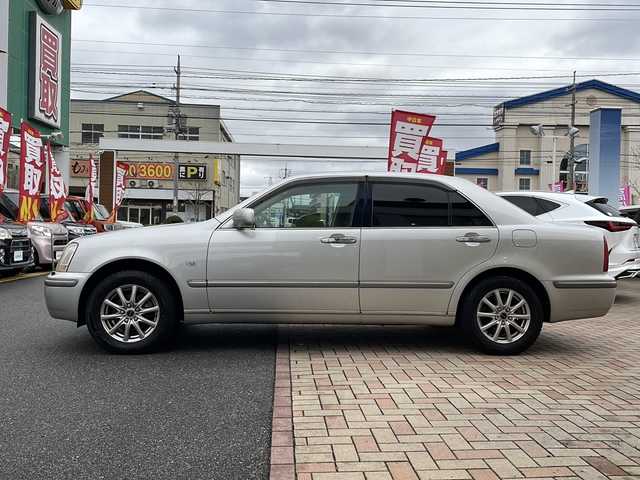 トヨタ プログレ NC250 プライムセレクション 鳥取県 2005(平17)年 6.4万km シルバーM 純正キーレス/メーカーOPナビゲーション/ウッドコンビハンドル/バック・フロントカメラ/前席パワーシート（Dメモリ）/オートフェンダーポール/CD/カセット/オートライト/キセノン/フォグライト/ETCユニット/保証書・取説