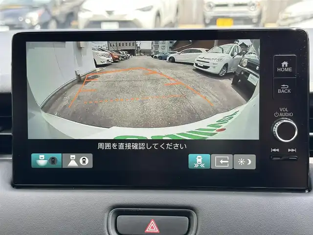 ホンダ ヴェゼル ハイブリッド e:HEV Z 三重県 2023(令5)年 1万km プラチナホワイトパール ホンダセンシング/ホンダコネクトディスプレイ/　・Bluetooth/　・Applecarplay (Bluetooth接続時)/　・フルセグＴＶ/　・USB/バックガイドカメラ/無限ドアバイザー/アダプティブクルーズコントロール/ブラインドスポットモニター/クリアランスソナー/ダウンヒルアシスト/パワーバックドア/スマートキーＸ２/プッシュスタート/LED（ヘッドライト・フォグライト）/ハーフレザーシート/Ｄ・Ｎ席シートヒーター/ステアリングヒーター/パドルシフト/オートリトラクタブルミラー/ターンミラー/ビルトインETC2.0/純正フロアマット（プレミアムタイプ）/横滑り防止機能