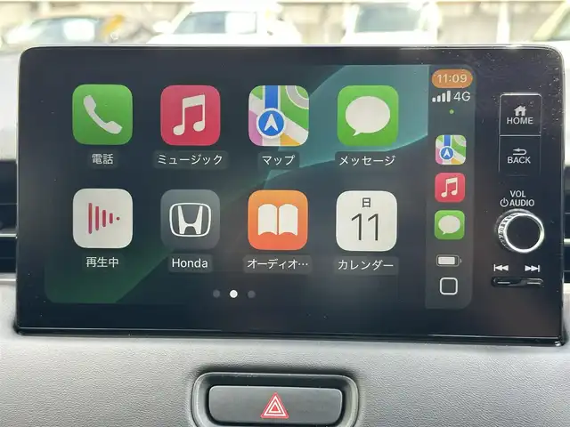 ホンダ ヴェゼル ハイブリッド e:HEV Z 三重県 2023(令5)年 1万km プラチナホワイトパール ホンダセンシング/ホンダコネクトディスプレイ/　・Bluetooth/　・Applecarplay (Bluetooth接続時)/　・フルセグＴＶ/　・USB/バックガイドカメラ/無限ドアバイザー/アダプティブクルーズコントロール/ブラインドスポットモニター/クリアランスソナー/ダウンヒルアシスト/パワーバックドア/スマートキーＸ２/プッシュスタート/LED（ヘッドライト・フォグライト）/ハーフレザーシート/Ｄ・Ｎ席シートヒーター/ステアリングヒーター/パドルシフト/オートリトラクタブルミラー/ターンミラー/ビルトインETC2.0/純正フロアマット（プレミアムタイプ）/横滑り防止機能