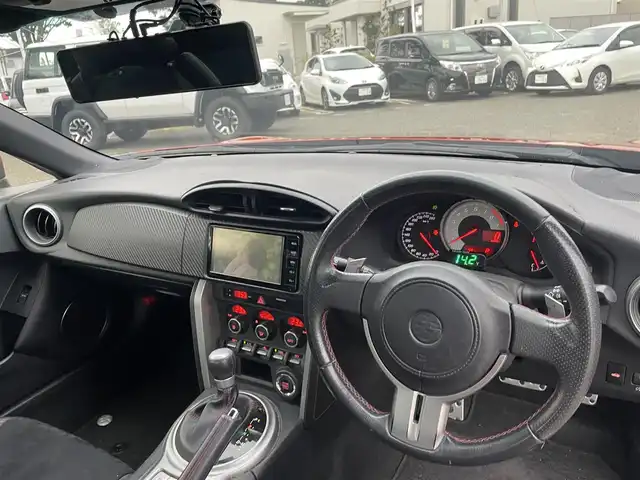 トヨタ ８６ GT リミテッド 宮城県 2015(平27)年 6.6万km オレンジメタリック 純正ナビ/バックカメラ/社外ルームミラー連動前後ドラレコ/ハーフレーザー/社外テレビキャンセラー/社外アルミスタッドレスタイヤ/プッシュスタート/横滑り防止スイッチ/電動格納ミラー