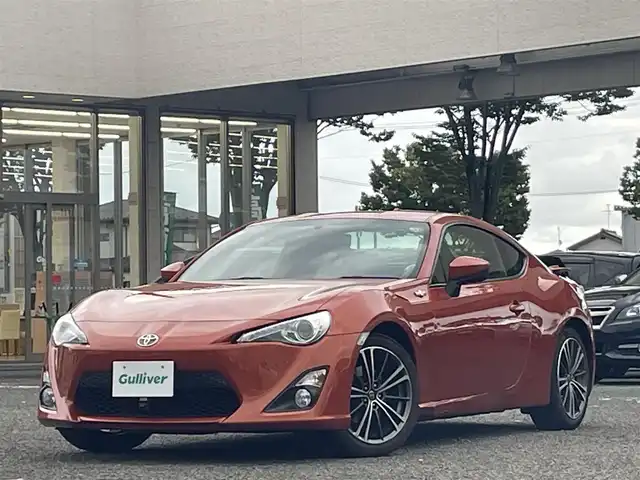 トヨタ ８６ GT リミテッド 宮城県 2015(平27)年 6.6万km オレンジメタリック 純正ナビ/バックカメラ/社外ルームミラー連動前後ドラレコ/ハーフレーザー/社外テレビキャンセラー/社外アルミスタッドレスタイヤ/プッシュスタート/横滑り防止スイッチ/電動格納ミラー