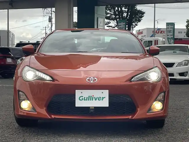 トヨタ ８６ GT リミテッド 宮城県 2015(平27)年 6.6万km オレンジメタリック 純正ナビ/バックカメラ/社外ルームミラー連動前後ドラレコ/ハーフレーザー/社外テレビキャンセラー/社外アルミスタッドレスタイヤ/プッシュスタート/横滑り防止スイッチ/電動格納ミラー