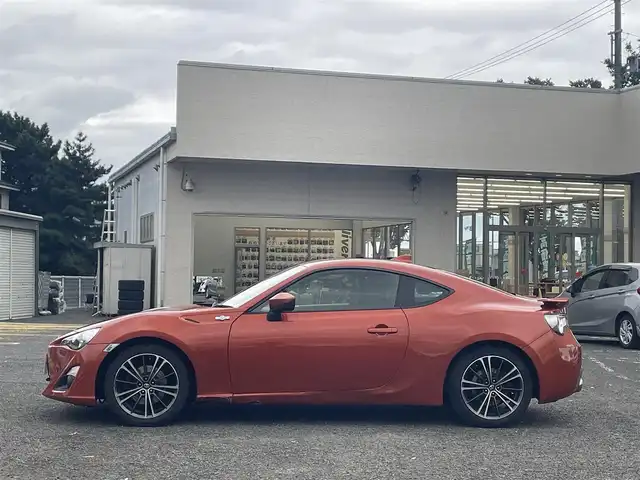 トヨタ ８６ GT リミテッド 宮城県 2015(平27)年 6.6万km オレンジメタリック 純正ナビ/バックカメラ/社外ルームミラー連動前後ドラレコ/ハーフレーザー/社外テレビキャンセラー/社外アルミスタッドレスタイヤ/プッシュスタート/横滑り防止スイッチ/電動格納ミラー