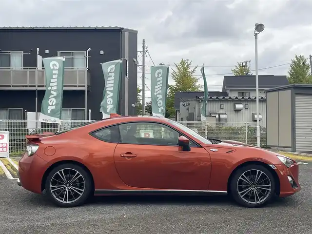 トヨタ ８６ GT リミテッド 宮城県 2015(平27)年 6.6万km オレンジメタリック 純正ナビ/バックカメラ/社外ルームミラー連動前後ドラレコ/ハーフレーザー/社外テレビキャンセラー/社外アルミスタッドレスタイヤ/プッシュスタート/横滑り防止スイッチ/電動格納ミラー