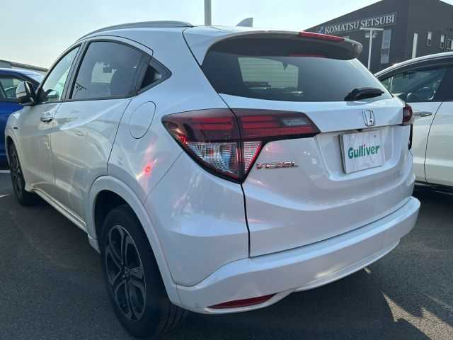 ホンダ ヴェゼル ハイブリッド Z 徳島県 2014(平26)年 12万km ホワイトオーキッドパール 純正8型SDナビ　VXM-145VFEi/(DISC/AUX/SD/iPod/USB/HDMI/BT/ラジオ/フルセグ)/バックカメラ/クルーズコントロール/純正17インチアルミホイール/ルーフレール/ハーフレザーシート/前席シートヒーター/純正フロアマット/LEDヘッドライト/ETC/ドライブレコーダー/オートライト