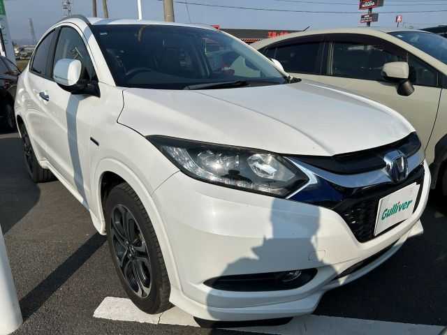 ホンダ ヴェゼル ハイブリッド Z 徳島県 2014(平26)年 12万km ホワイトオーキッドパール 純正8型SDナビ　VXM-145VFEi/(DISC/AUX/SD/iPod/USB/HDMI/BT/ラジオ/フルセグ)/バックカメラ/クルーズコントロール/純正17インチアルミホイール/ルーフレール/ハーフレザーシート/前席シートヒーター/純正フロアマット/LEDヘッドライト/ETC/ドライブレコーダー/オートライト