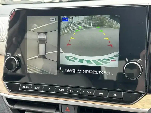 日産 オーラ G レザーエディション 愛媛県 2023(令5)年 2.2万km ガーネットレッド/スーパーブラック 2トーン 登録時走行距離：21270km/禁煙車/純正ナビ/Bluetooth/HDMI/フルセグ/ワンオーナー/ステアリングヒーター/ワイヤレス充電/ブラインドスポットモニター/クリアランスソナー/全方位バックカメラ/クルーズコントロール/プッシュスタート/ビルトインETC/BOSEスピーカー/衝突被害軽減システム/ドライブレコーダー