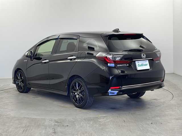 ホンダ シャトル ハイブリッド ホンダセンシング 栃木県 2019(令1)年 4.4万km クリスタルブラックパール 社外8型メモリーナビゲーション【AVIC-RL810】/（CD/DVD/BT/フルセグ/AM/FM）/バックカメラ/ホンダセンシング/CMBS衝突軽減ブレーキ/誤発進抑制機能/アダブティブクルーズコントロールACC/LKAS車線維持支援システム/路外逸脱抑制機能/先行車発進お知らせ機能/標識認識機能/後方誤発進抑制機能/純正ビルトインETC/社外前方ドライブレコーダー/ECON/プッシュスタート/スマートキー/純正サイド/リアスポイラー/社外前方ドライブレコーダー/社外17インチアルミホイール/スペアキー