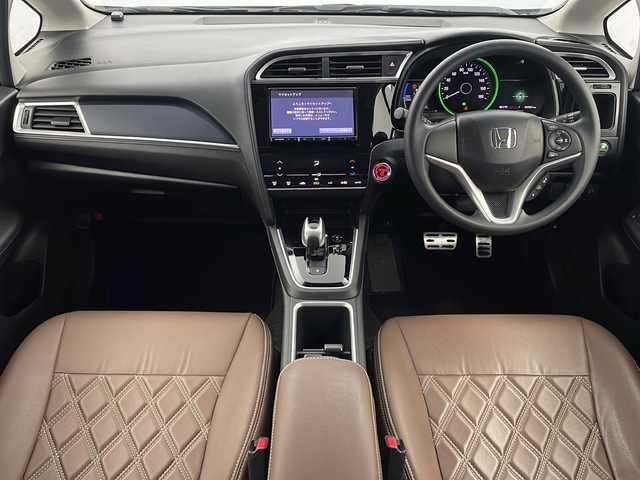 ホンダ シャトル ハイブリッド ホンダセンシング 栃木県 2019(令1)年 4.4万km クリスタルブラックパール 社外8型メモリーナビゲーション【AVIC-RL810】/（CD/DVD/BT/フルセグ/AM/FM）/バックカメラ/ホンダセンシング/CMBS衝突軽減ブレーキ/誤発進抑制機能/アダブティブクルーズコントロールACC/LKAS車線維持支援システム/路外逸脱抑制機能/先行車発進お知らせ機能/標識認識機能/後方誤発進抑制機能/純正ビルトインETC/社外前方ドライブレコーダー/ECON/プッシュスタート/スマートキー/純正サイド/リアスポイラー/社外前方ドライブレコーダー/社外17インチアルミホイール/スペアキー