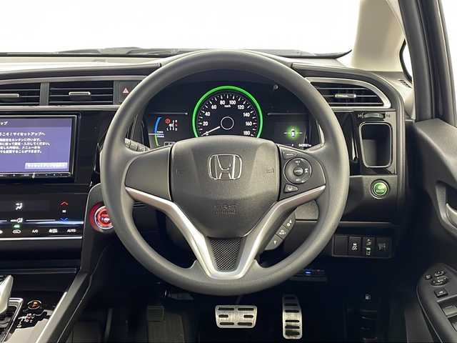 ホンダ シャトル ハイブリッド ホンダセンシング 栃木県 2019(令1)年 4.4万km クリスタルブラックパール 社外8型メモリーナビゲーション【AVIC-RL810】/（CD/DVD/BT/フルセグ/AM/FM）/バックカメラ/ホンダセンシング/CMBS衝突軽減ブレーキ/誤発進抑制機能/アダブティブクルーズコントロールACC/LKAS車線維持支援システム/路外逸脱抑制機能/先行車発進お知らせ機能/標識認識機能/後方誤発進抑制機能/純正ビルトインETC/社外前方ドライブレコーダー/ECON/プッシュスタート/スマートキー/純正サイド/リアスポイラー/社外前方ドライブレコーダー/社外17インチアルミホイール/スペアキー