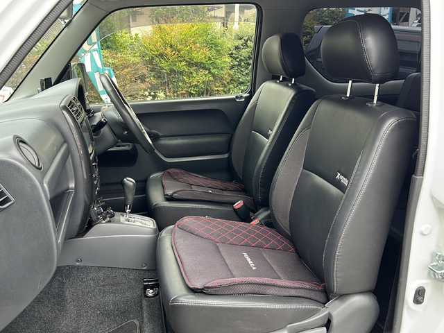 スズキ ジムニー クロスアドベンチャー XC 埼玉県 2011(平23)年 10.9万km パールホワイト メモリナビ/ワンセグテレビ/ウィンカーミラー/ETC/4WD/DVD機能再生有/16インチアルミホイール/背面タイヤ/運転席シートヒーター/ドライブレコーダー 有/Bluetooth/レーダー探知機 有(SUPER CAT)/運転席・助手席　エアバック有/本革巻きステアリング