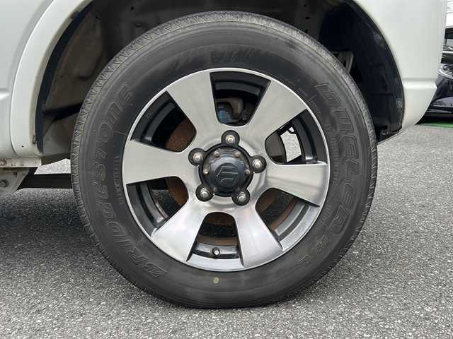 スズキ ジムニー クロスアドベンチャー XC 埼玉県 2011(平23)年 10.9万km パールホワイト メモリナビ/ワンセグテレビ/ウィンカーミラー/ETC/4WD/DVD機能再生有/16インチアルミホイール/背面タイヤ/運転席シートヒーター/ドライブレコーダー 有/Bluetooth/レーダー探知機 有(SUPER CAT)/運転席・助手席　エアバック有/本革巻きステアリング