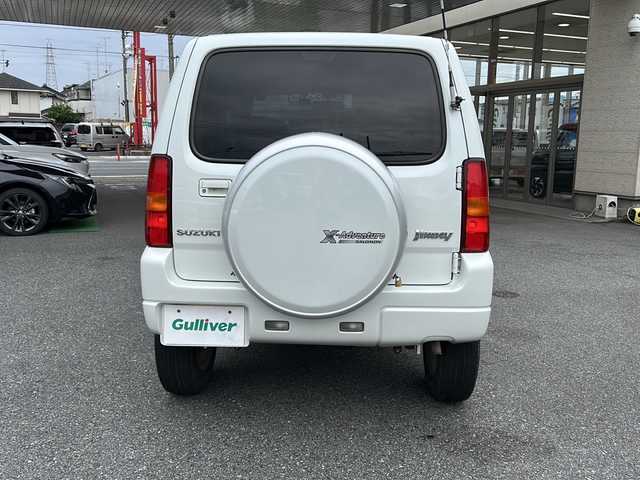 スズキ ジムニー クロスアドベンチャー XC 埼玉県 2011(平23)年 10.9万km パールホワイト メモリナビ/ワンセグテレビ/ウィンカーミラー/ETC/4WD/DVD機能再生有/16インチアルミホイール/背面タイヤ/運転席シートヒーター/ドライブレコーダー 有/Bluetooth/レーダー探知機 有(SUPER CAT)/運転席・助手席　エアバック有/本革巻きステアリング