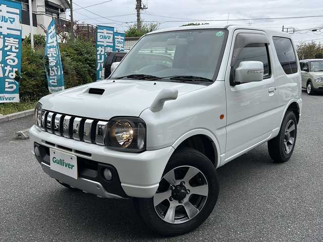 スズキ ジムニー クロスアドベンチャー XC 埼玉県 2011(平23)年 10.9万km パールホワイト メモリナビ/ワンセグテレビ/ウィンカーミラー/ETC/4WD/DVD機能再生有/16インチアルミホイール/背面タイヤ/運転席シートヒーター/ドライブレコーダー 有/Bluetooth/レーダー探知機 有(SUPER CAT)/運転席・助手席　エアバック有/本革巻きステアリング