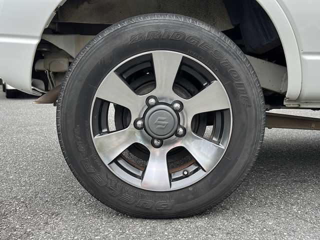 スズキ ジムニー クロスアドベンチャー XC 埼玉県 2011(平23)年 10.9万km パールホワイト メモリナビ/ワンセグテレビ/ウィンカーミラー/ETC/4WD/DVD機能再生有/16インチアルミホイール/背面タイヤ/運転席シートヒーター/ドライブレコーダー 有/Bluetooth/レーダー探知機 有(SUPER CAT)/運転席・助手席　エアバック有/本革巻きステアリング