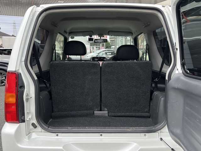 スズキ ジムニー クロスアドベンチャー XC 埼玉県 2011(平23)年 10.9万km パールホワイト メモリナビ/ワンセグテレビ/ウィンカーミラー/ETC/4WD/DVD機能再生有/16インチアルミホイール/背面タイヤ/運転席シートヒーター/ドライブレコーダー 有/Bluetooth/レーダー探知機 有(SUPER CAT)/運転席・助手席　エアバック有/本革巻きステアリング