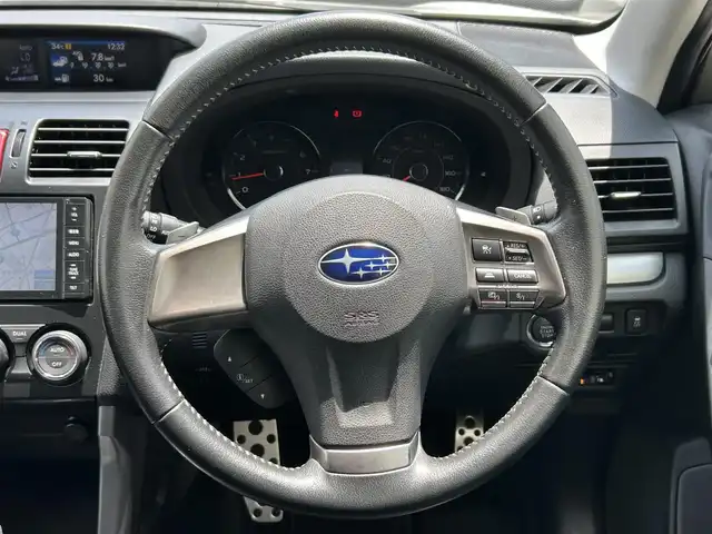 スバル フォレスター 2．0XT アイサイト 東京都 2013(平25)年 6.4万km サテンホワイトパール STIフロントアンダースポイラー/純正SDナビ/　フルセグTV/CD/DVD/Bluetooth/USB//バックカメラ/全車速追従機能付クルーズコントロール/プリクラッシュブレーキ/先行車発進おしらせ/車線逸脱警報/AT誤発進抑制/ハーフレザーシート/パワーシート/シートヒーター/キセノンヘッドライト/フォグランプ/オートライト/純正18インチアルミホイール/プッシュスタート/スマートキー×2/ETC/保証書/取扱説明書
