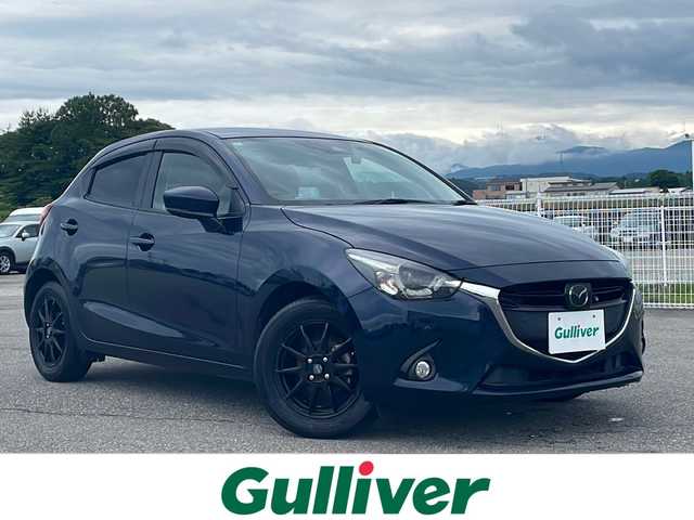 マツダ デミオ 13Sテーラードブラウン 富山県 2018(平30)年 5.3万km ディープクリスタルブルーマイカ 純正ナビ/ワンセグＴＶ/全方位カメラ/ＣＤ・ＤＶＤ・ＢＴ/レーダークルーズコントロール/レーンキープアシスト/コーナーセンサー/アイドリングストップ/オートライト/LEDヘッドライト/社外ＡＷ/純正フロアマット/シートヒーター/AAC/プッシュスタート/スマートキー/スペアキー/保証書/取扱説明書/記録簿