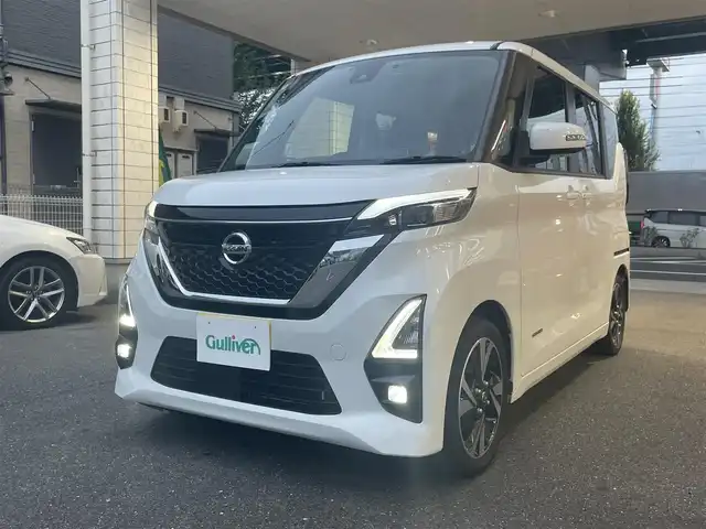 日産 ルークス HWS Gターボ プロパイロットED 愛知県 2022(令4)年 2.5万km ホワイトパール 両側パワースライドドア/純正9型ナビ〈MM316D-L〉/・地デジTV/DVD/SD/・AUX/Bluetooth/アラウンドビューカメラ/プロパイロット/・インテリジェントクルーズコントロール/・ハンドル支援/インテリジェントエマージェンシーブレーキ/前方衝突予測警報/踏み間違い衝突防止アシスト/車線逸脱警報/車線逸脱防止支援システム/ふらつき警報/標識認識機能/先行車発進告知機能/インテリジェントアラウンドビューモニター/ディスプレイ付きルームミラー/前後クリアランスソナー/シートバックテーブル/ETC/ナビ連動純正ドライブレコーダー/純正15インチAW/インテリジェントキー