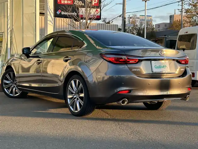 マツダ アテンザ セダン 25S Lパッケージ 道央・札幌 2019(平31)年 2.5万km マシーングレープレミアムM ・マツダコネクトナビ/・バックカメラ/・Bluetooth/・ワンセグTV/・DVD再生可能/・i　stop/・パーキングアシスト/・アイドリングストップ/・レーンキープアシスト/・コーナーセンサー/・ETC/・茶革シート/・シートヒーター/・エアシート/・パドルシフト/・純正19インチAW/・積込スタッドレス付き