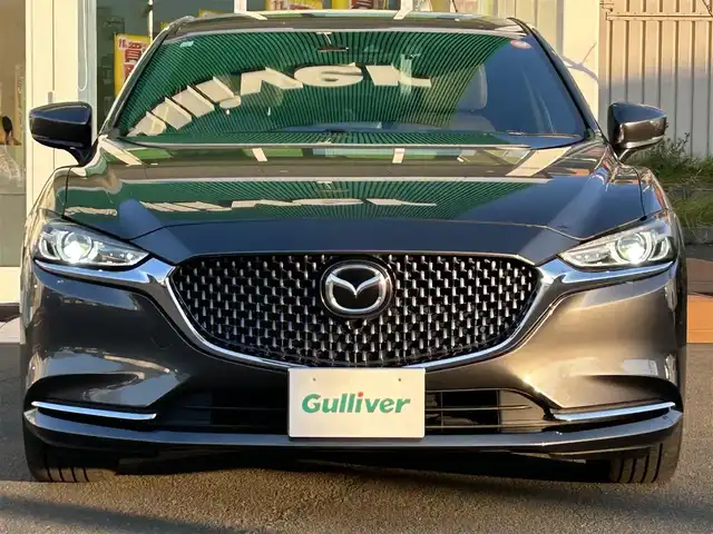 マツダ アテンザ セダン 25S Lパッケージ 道央・札幌 2019(平31)年 2.5万km マシーングレープレミアムM ・マツダコネクトナビ/・バックカメラ/・Bluetooth/・ワンセグTV/・DVD再生可能/・i　stop/・パーキングアシスト/・アイドリングストップ/・レーンキープアシスト/・コーナーセンサー/・ETC/・茶革シート/・シートヒーター/・エアシート/・パドルシフト/・純正19インチAW/・積込スタッドレス付き