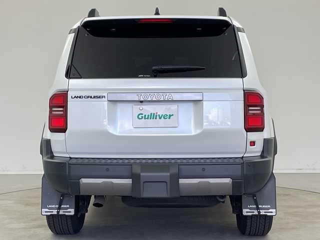 トヨタ ランドクルーザー ２５０ VX 新潟県 2025(令7)年 1.2万km プラチナホワイトパールマイカ 4WD/ワンオーナー/純正12.3型コネクティッドplusディスプレイオーディオ/（AM/FM/フルセグTV/Bluetooth/Miracast/HDMI）/JBLプレミアムサウンド/パノラミックビューモニター/ムーンルーフ/D席パワーシート/D+N席シートヒーター/シートベンチレーション/ステアリングヒーター/寒冷地仕様PWR HEAT/デジタルインナーミラー/Qi充電/パワーバックドア/トヨタセーフティセンス/・プリクラッシュセーフティ/・レーントレーシングアシスト/・レーンディパーチャーアラート/・レーダークルーズコントロール/・アダプティブハイビームシステム／オートマチックハイビーム/・ロードサインアシスト/・ドライバー異常時対応システム/・発進遅れ告知機能/トヨタチームメイト/Classioフロアマット/ブラックルーフレール/純正18インチAW