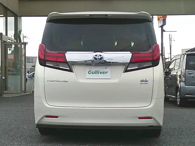トヨタ アルファードハイブリット X 埼玉県 2015(平27)年 7.2万km ラグジュアリーホワイトパールクリスタルシャインガラスフレーク ・ディーラー記録簿（H27～R7まで完備）/・ワンオーナー/・サンルーフ/・両側パワースライドドア/・クルーズコントロール/・社外・デジタルインナーミラー（前後ドラレコ機能有）/・アルパイン10インチナビ/・アルパイン13インチフリップダウンモニター/・クラリオンフロントスピーカー/・クラリオンリアスピーカー/・カロッツェリア天吊りスピーカー/・アルパインアンプ/・社外・LEDルームランプ/・社外・皮調シートカバー/・社外・シフトゲートLEDイルミランプ/・2列目オットマンシート/・AC１００V電源/・社外・フルカラーLEDフットランプ/・社外・ルーフカラーイルミコントローラー/・TEIN車高調（フレックスZ)/・ロクサーニメイオール21インチアルミ/（９．０J　＋３８）/・コンチネンタルマックスコンタクトタイヤ21インチ/・HIDヘッドライト/・HIDフォグランプ/・社外・スーパーウェルカムライティングキット/・社外・アイドリングライトキット/・社外・アルミスカッフプレート/・社外・ホーン（クラクソンストリトーン）/・スマートキー×２/・プッシュスタート/・保証書/・取説