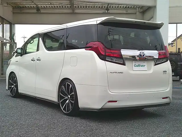 トヨタ アルファードハイブリット X 埼玉県 2015(平27)年 7.2万km ラグジュアリーホワイトパールクリスタルシャインガラスフレーク ・ディーラー記録簿（H27～R7まで完備）/・ワンオーナー/・サンルーフ/・両側パワースライドドア/・クルーズコントロール/・社外・デジタルインナーミラー（前後ドラレコ機能有）/・アルパイン10インチナビ/・アルパイン13インチフリップダウンモニター/・クラリオンフロントスピーカー/・クラリオンリアスピーカー/・カロッツェリア天吊りスピーカー/・アルパインアンプ/・社外・LEDルームランプ/・社外・皮調シートカバー/・社外・シフトゲートLEDイルミランプ/・2列目オットマンシート/・AC１００V電源/・社外・フルカラーLEDフットランプ/・社外・ルーフカラーイルミコントローラー/・TEIN車高調（フレックスZ)/・ロクサーニメイオール21インチアルミ/（９．０J　＋３８）/・コンチネンタルマックスコンタクトタイヤ21インチ/・HIDヘッドライト/・HIDフォグランプ/・社外・スーパーウェルカムライティングキット/・社外・アイドリングライトキット/・社外・アルミスカッフプレート/・社外・ホーン（クラクソンストリトーン）/・スマートキー×２/・プッシュスタート/・保証書/・取説