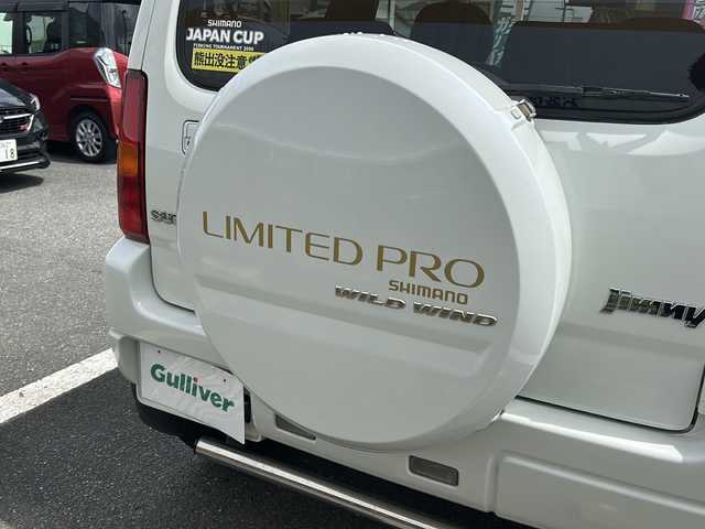 スズキ ジムニー ワイルドウィンド 山口県 2007(平19)年 9.4万km パールホワイト 社外CD/USB/BT/純正１６インチアルミホイール/社外バンパーガード/ハードタイヤケース/右前席シートヒーター/革巻きステアリング/ヘッドライトレベライザー/ミラーヒーター/純正キーレス/フロアマット/ドアバイザー/ETC/電動格納ドアミラー