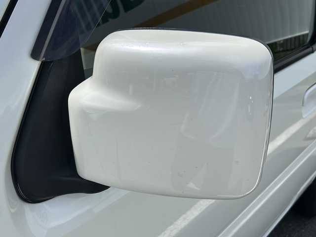 スズキ ジムニー ワイルドウィンド 山口県 2007(平19)年 9.4万km パールホワイト 社外CD/USB/BT/純正１６インチアルミホイール/社外バンパーガード/ハードタイヤケース/右前席シートヒーター/革巻きステアリング/ヘッドライトレベライザー/ミラーヒーター/純正キーレス/フロアマット/ドアバイザー/ETC/電動格納ドアミラー