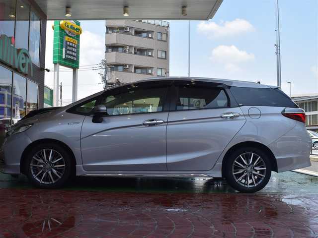 ホンダ シャトル ハイブリッド Z ホンダセンシング 神奈川県 2020(令2)年 4.7万km ルナシルバーM ワンオーナー/新車時保証書/取扱説明書/シルバールーフレール/純正SDナビ/(フルセグTV/CD/DVD/SD/BT/USB)/バックカメラ/衝突軽減防止＆警報/車線逸脱防止＆警報/アダプティブクルーズコントロール/先行車発進検知/ロードサインアシスト/パーキングアシスト/シートヒーター(D＋N席)/デュアルオートエアコン/革巻きステアリング/ステアリングスイッチ/パドルシフト/オートライト/横滑り防止/プッシュスタート＆スマートキー/ウインカー付き電動格納ミラー/スペアキー/ドアバイザー/LEDヘッドライト/フォグランプ/純正フロアマット
