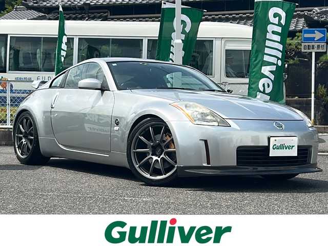 日産 フェアレディ Ｚ バージョンS 愛知県 2002(平14)年 7.6万km ダイヤモンドシルバー /禁煙車//社外ナビ(AVIC-MRP007)//社外１９インチアルミ//アミューズチタンマフラー//ビルシュタイン車高調//社外ステアリング//ETC//キーレスエントリー//電動格納ミラー//フロアマット//新車保証書//スペアキー