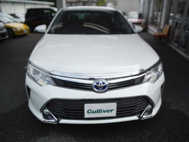 トヨタ カムリ ハイブリット Gパッケージ 東京都 2015(平27)年 7.3万km パール 保証書・取説あり/純正ナビ・TV（ジャンパー付）/　BLUETOOTH・ETC/　バックカメラ/ドラレコ前後/クルーズコントロール/D席パワーシート/キセノンライト/スマートキー×2個