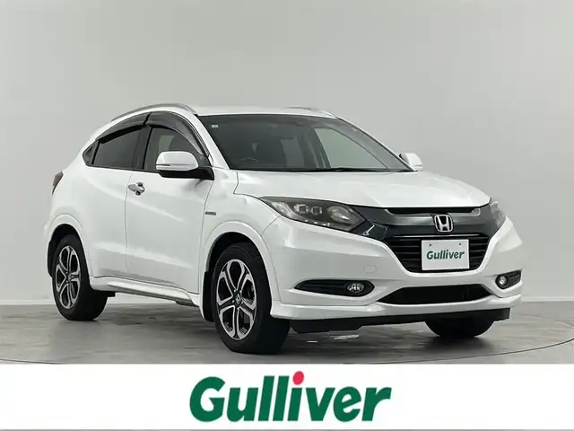 ホンダ ヴェゼル ハイブリッド Z 埼玉県 2015(平27)年 5.1万km ホワイトオーキッドパール 純正8インチナビ　フルセグ　CD DVD BT　バックカメラ　ホンダセンシング　クルコン　ドラレコ　ハーフレザーシート　シートヒーター　ビルトインETC　LEDオートライト　