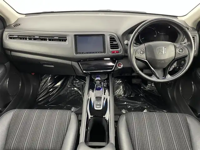 ホンダ ヴェゼル ハイブリッド Z 埼玉県 2015(平27)年 5.1万km ホワイトオーキッドパール 純正8インチナビ　フルセグ　CD DVD BT　バックカメラ　ホンダセンシング　クルコン　ドラレコ　ハーフレザーシート　シートヒーター　ビルトインETC　LEDオートライト　
