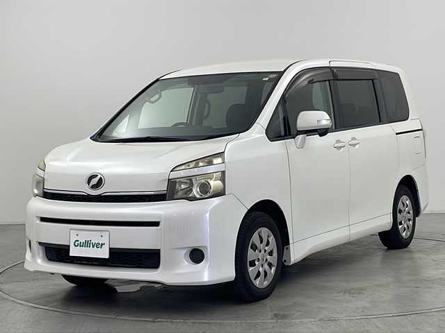 トヨタ ヴォクシー X Lエディション 群馬県 2011(平23)年 6.8万km ホワイトパールクリスタルシャイン 純正ナビ　純正９型後席モニター　バックカメラ　両側電動スライドドア　ビルトインＥＴＣ　ステアリングスイッチ　ＨＩＤヘッドライト　オートライト　ＭＴモード付きＡＴ　電動格納ミラー　キーレス　禁煙車