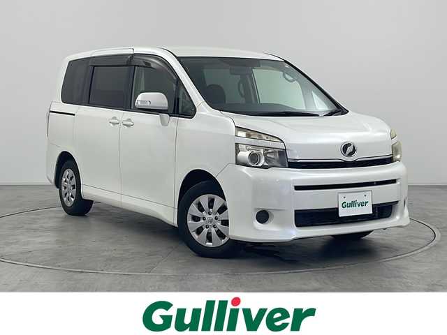 トヨタ ヴォクシー X Lエディション 群馬県 2011(平23)年 6.8万km ホワイトパールクリスタルシャイン 純正ナビ　純正９型後席モニター　バックカメラ　両側電動スライドドア　ビルトインＥＴＣ　ステアリングスイッチ　ＨＩＤヘッドライト　オートライト　ＭＴモード付きＡＴ　電動格納ミラー　キーレス　禁煙車