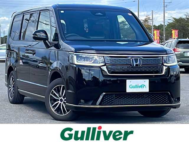 ホンダ ステップワゴン スパーダ 道央・札幌 2023(令5)年 3.3万km クリスタルブラックパール ４WD/寒冷地仕様/純正メモリーナビ/CD/DVD/BT/フルセグ/ホンダセンシング/衝突被害軽減ブレーキ/横滑り防止装置/レーダークルーズコントロール/レーンキープアシスト/クリアランスソナー/バックカメラ/ビルトインETC/アイドリングストップ/ワイパーデアイサー/ECOMODE/両側パワースライドドア/パワーバックドア/前席シートヒーター/ハーフレザーシート/革巻きステアリング/ステアリングリモコン/パドルシフト/電動パーキング/ブレーキホールド/MTモード付AT/プッシュスタート/スマートキー/LEDヘッドライト/オートライト/オートマチックハイビーム/フォグランプ/電動格納ミラー/ウィンカーミラー/社外フロアマット/ドアバイザー