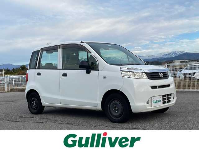 ホンダ ライフ C 富山県 2013(平25)年 9.2万km タフタホワイト 禁煙車/社外メモリナビ/純正フロアマット/社外ＥＴＣ/リモコンキー/ハロゲンヘッドライト/横滑り防止装置/パワーウィンドウ