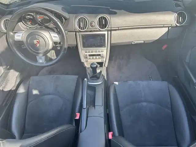 ポルシェ ボクスター 千葉県 2007(平19)年 5万km アトラスグレー 左ハンドル/5速MT/オープンカー/社外ディスプレイオーディオ/・AM/FM/BT/ビルトインETC/シートヒーター（D+N席）/純正フロアマット/アンチロック・ブレーキ・システム/純正17インチアルミホイール/エアバッグ（W+サイド）/保証書/扱説明書