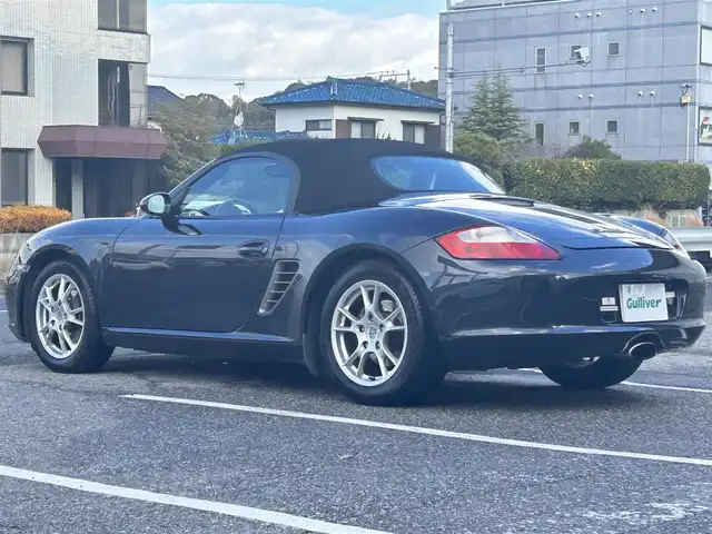 ポルシェ ボクスター 千葉県 2007(平19)年 5万km アトラスグレー 左ハンドル/5速MT/オープンカー/社外ディスプレイオーディオ/・AM/FM/BT/ビルトインETC/シートヒーター（D+N席）/純正フロアマット/アンチロック・ブレーキ・システム/純正17インチアルミホイール/エアバッグ（W+サイド）/保証書/扱説明書