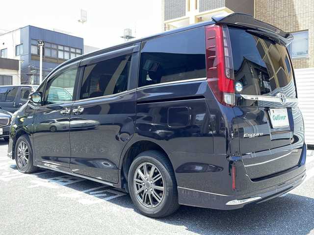 トヨタ エスクァイア ハイブリッド Xi 広島県 2015(平27)年 10.6万km スパークリングブラックパールクリスタルシャイン /登録時走行距離/　　　　　　　105699キロ/社外ナビ/バックカメラ/地デジ/左後パワースライドドア/社外フリップダウンモニター/　　【PCX-RM3505】/シートヒーター/ビルトインETC/新車時整備手帳/　　【保証書】/取扱説明書/