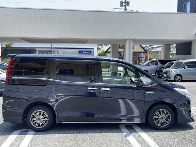 トヨタ エスクァイア ハイブリッド Xi 広島県 2015(平27)年 10.6万km スパークリングブラックパールクリスタルシャイン /登録時走行距離/　　　　　　　105699キロ/社外ナビ/バックカメラ/地デジ/左後パワースライドドア/社外フリップダウンモニター/　　【PCX-RM3505】/シートヒーター/ビルトインETC/新車時整備手帳/　　【保証書】/取扱説明書/