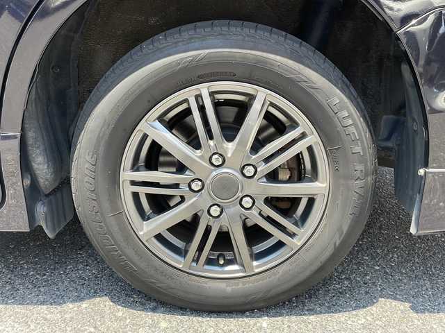 トヨタ エスクァイア ハイブリッド Xi 広島県 2015(平27)年 10.6万km スパークリングブラックパールクリスタルシャイン /登録時走行距離/　　　　　　　105699キロ/社外ナビ/バックカメラ/地デジ/左後パワースライドドア/社外フリップダウンモニター/　　【PCX-RM3505】/シートヒーター/ビルトインETC/新車時整備手帳/　　【保証書】/取扱説明書/