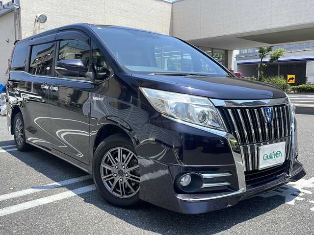 トヨタ エスクァイア ハイブリッド Xi 広島県 2015(平27)年 10.6万km スパークリングブラックパールクリスタルシャイン /登録時走行距離/　　　　　　　105699キロ/社外ナビ/バックカメラ/地デジ/左後パワースライドドア/社外フリップダウンモニター/　　【PCX-RM3505】/シートヒーター/ビルトインETC/新車時整備手帳/　　【保証書】/取扱説明書/
