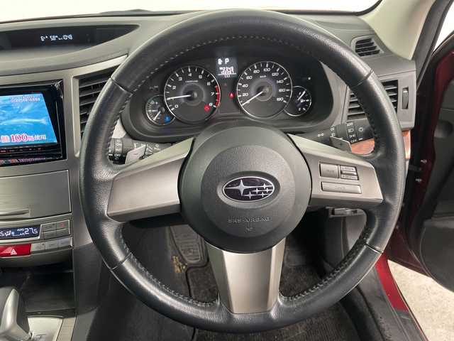 スバル アウトバック 2．5i Lパッケージ 道央・札幌 2010(平22)年 10.3万km カメリアレッドパール ・４WD/・社外ナビ/・DVD.CD.SD.BT.ワンセグ/・バックカメラ/・SIドライブ/・ドライブレコーダー/・パドルシフト/・HIDライト/オートライト/・クルーズコントロール/・パワーシートフロント左右/・ビルトインETC/・スマートキーｘ２