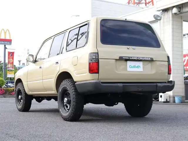 トヨタ ランドクルーザー VX－LTD 神奈川県 1994(平6)年 13.6万km ベージュ 60フェイス（色替え）/リフトアップ/ナローボディ/1ナンバー登録/BF Goodrich All-terrain/：235/85R16（ホワイトレター）/PROUD HORN/社外ウッドステアリング/サンルーフ/メモリナビ/：フルセグTV/：CD DVD再生/：Bluetoothオーディオ/：バックカメラ/社外フロアマット/純正キー/：リモコン有り/ETC/ドラレコ（フロント）/社外シートカバー/ーーーーーーーーーーーーーーーーーーー/取扱説明書