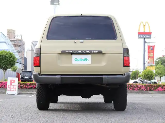 トヨタ ランドクルーザー VX－LTD 神奈川県 1994(平6)年 13.6万km ベージュ 60フェイス（色替え）/リフトアップ/ナローボディ/1ナンバー登録/BF Goodrich All-terrain/：235/85R16（ホワイトレター）/PROUD HORN/社外ウッドステアリング/サンルーフ/メモリナビ/：フルセグTV/：CD DVD再生/：Bluetoothオーディオ/：バックカメラ/社外フロアマット/純正キー/：リモコン有り/ETC/ドラレコ（フロント）/社外シートカバー/ーーーーーーーーーーーーーーーーーーー/取扱説明書